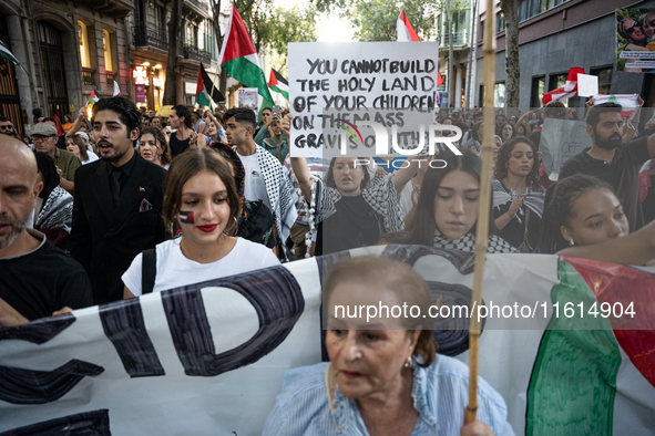 Thousands of people demonstrate in the center of Barcelona, Spain, on September 27, 2024, on the day that a general strike is declared in Sp...