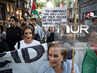 Thousands of people demonstrate in the center of Barcelona, Spain, on September 27, 2024, on the day that a general strike is declared in Sp...