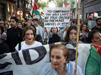 Thousands of people demonstrate in the center of Barcelona, Spain, on September 27, 2024, on the day that a general strike is declared in Sp...