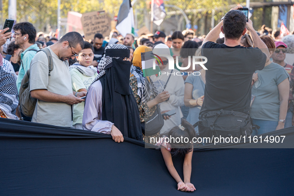 Thousands of people demonstrate in the center of Barcelona, Spain, on September 27, 2024, on the day that a general strike is declared in Sp...