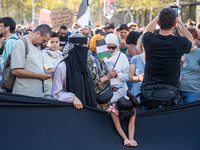 Thousands of people demonstrate in the center of Barcelona, Spain, on September 27, 2024, on the day that a general strike is declared in Sp...