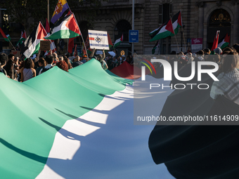 Thousands of people demonstrate in the center of Barcelona, Spain, on September 27, 2024, on the day that a general strike is declared in Sp...