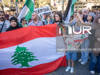 Thousands of people demonstrate in the center of Barcelona, Spain, on September 27, 2024, on the day that a general strike is declared in Sp...