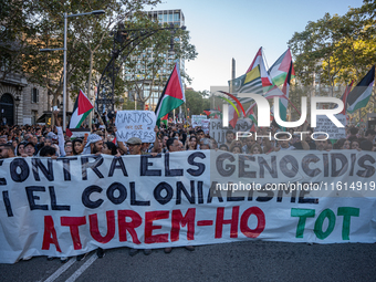 Thousands of people demonstrate in the center of Barcelona, Spain, on September 27, 2024, on the day that a general strike is declared in Sp...