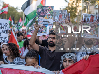 Thousands of people demonstrate in the center of Barcelona, Spain, on September 27, 2024, on the day that a general strike is declared in Sp...