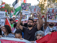 Thousands of people demonstrate in the center of Barcelona, Spain, on September 27, 2024, on the day that a general strike is declared in Sp...