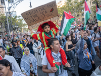 Thousands of people demonstrate in the center of Barcelona, Spain, on September 27, 2024, on the day that a general strike is declared in Sp...