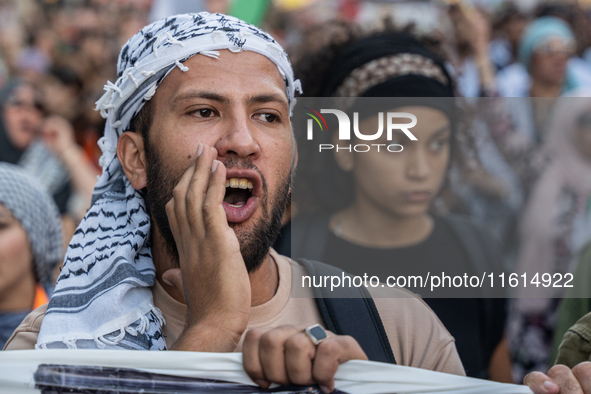 Thousands of people demonstrate in the center of Barcelona, Spain, on September 27, 2024, on the day that a general strike is declared in Sp...