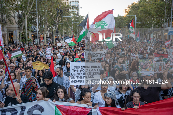 Thousands of people demonstrate in the center of Barcelona, Spain, on September 27, 2024, on the day that a general strike is declared in Sp...