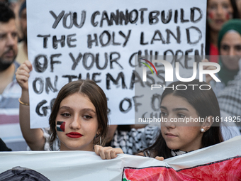 Thousands of people demonstrate in the center of Barcelona, Spain, on September 27, 2024, on the day that a general strike is declared in Sp...