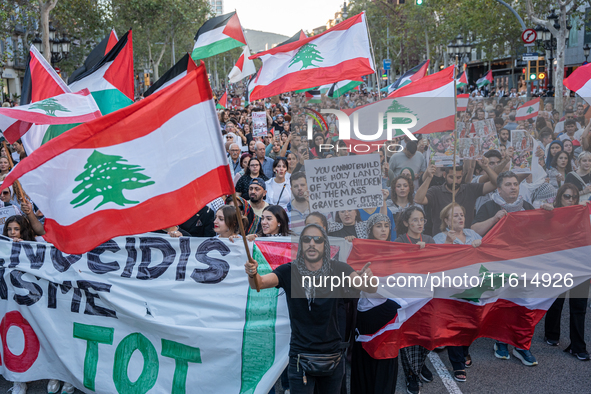 Thousands of people demonstrate in the center of Barcelona, Spain, on September 27, 2024, on the day that a general strike is declared in Sp...