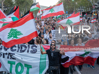 Thousands of people demonstrate in the center of Barcelona, Spain, on September 27, 2024, on the day that a general strike is declared in Sp...