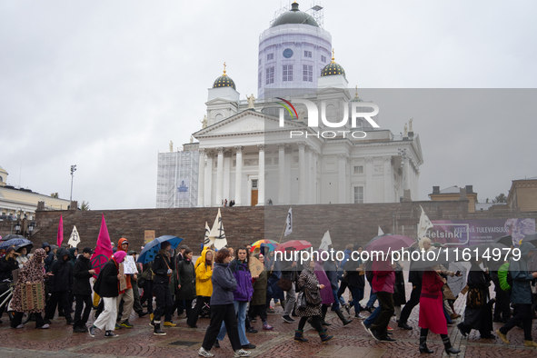 Activists from the environmental group Extinction Rebellion Finland ''Elokapina'' protest in Helsinki, Finland, on September 27, 2024. The g...