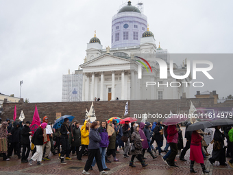 Activists from the environmental group Extinction Rebellion Finland ''Elokapina'' protest in Helsinki, Finland, on September 27, 2024. The g...