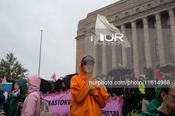 Activists from the environmental group Extinction Rebellion Finland ''Elokapina'' protest in front of the Finnish Parliament in Helsinki, Fi...