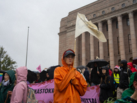 Activists from the environmental group Extinction Rebellion Finland ''Elokapina'' protest in front of the Finnish Parliament in Helsinki, Fi...