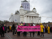 Activists from the environmental group Extinction Rebellion Finland ''Elokapina'' protest in Helsinki, Finland, on September 27, 2024. The g...