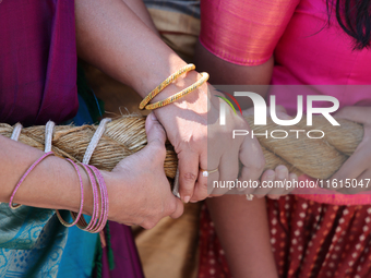 Women pull the chariot as Tamil Hindu devotees take part in the chariot procession (ther) during the Ganesha Mahotshava Vingnapanam Festival...