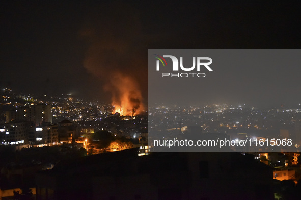 The Israeli military conducts an airstrike on the Dahieh area located south of Beirut, Lebanon, resulting in plumes of smoke rising from the...