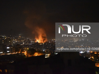 The Israeli military conducts an airstrike on the Dahieh area located south of Beirut, Lebanon, resulting in plumes of smoke rising from the...