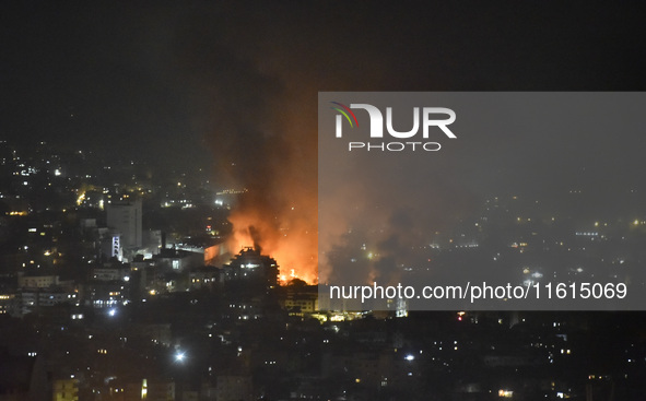 The Israeli military conducts an airstrike on the Dahieh area located south of Beirut, Lebanon, resulting in plumes of smoke rising from the...