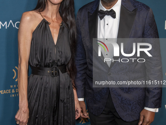 Caroline Descombris and Forest Whitaker attend the 2024 Faces Of Hope Gala at Gotham Hall in New York, USA, on September 27, 2024. (