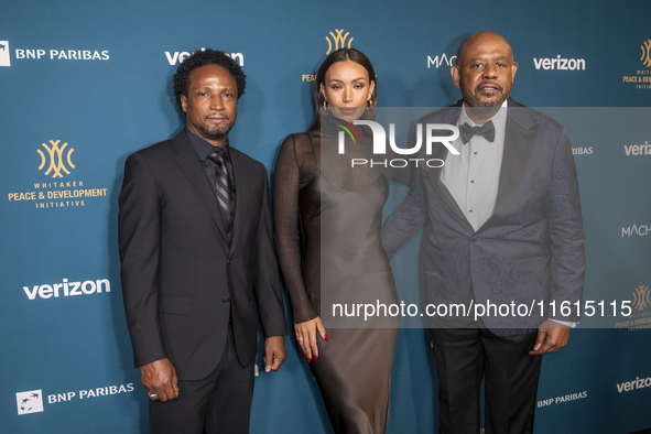 Elvis Nolasco, Ilfenesh Hadera, and Forest Whitaker attend the 2024 Faces Of Hope Gala at Gotham Hall in New York, New York, USA, on Septemb...