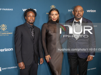 Elvis Nolasco, Ilfenesh Hadera, and Forest Whitaker attend the 2024 Faces Of Hope Gala at Gotham Hall in New York, New York, USA, on Septemb...