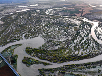 The Populus euphratica forest wetland lies on both sides of the Tarim River Bridge along the desert highway in Bazhou, Xinjiang province, Ch...