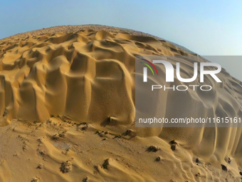 A panoramic view of the ''Whale Sand Mountain'' scenic spot on the desert highway in Bazhou, Xinjiang, China, on September 23, 2024. (