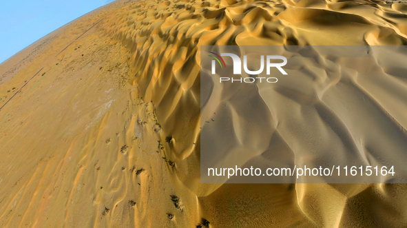 A panoramic view of the ''Whale Sand Mountain'' scenic spot on the desert highway in Bazhou, Xinjiang, China, on September 23, 2024. 