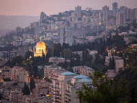 Dawn breaks over the northern Israeli port city of Haifa, in Israel, on September 28, 2024, one day following large-scale Israeli air strike...