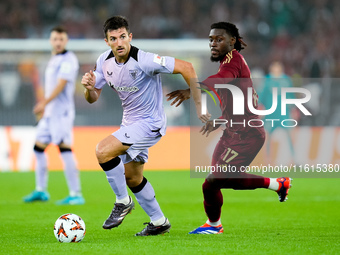 Daniel Vivian of Athletic Club and Manu Kone' of AS Roma compete for the ball during the UEFA Europa League 2024/25 League Phase MD1 match b...