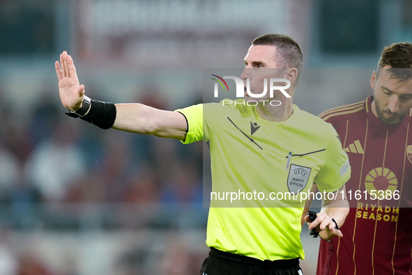 Referee Georgi Kabakov gestures during the UEFA Europa League 2024/25 League Phase MD1 match between AS Roma and Athletic Club at Stadio Oli...