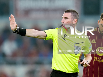 Referee Georgi Kabakov gestures during the UEFA Europa League 2024/25 League Phase MD1 match between AS Roma and Athletic Club at Stadio Oli...