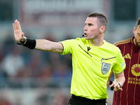 Referee Georgi Kabakov gestures during the UEFA Europa League 2024/25 League Phase MD1 match between AS Roma and Athletic Club at Stadio Oli...