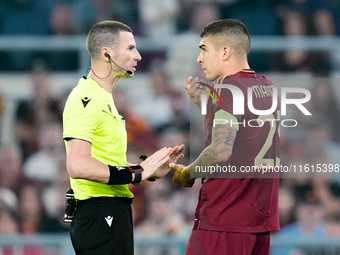 Gianluca Mancini of AS Roma talks to referee Georgi Kabakov during the UEFA Europa League 2024/25 League Phase MD1 match between AS Roma and...