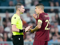 Gianluca Mancini of AS Roma talks to referee Georgi Kabakov during the UEFA Europa League 2024/25 League Phase MD1 match between AS Roma and...