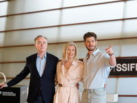 John Crowley, Andrew Garfield, and Fiona Weir attend the photocall for ''We Live in the Time'' during the 72nd San Sebastian International F...