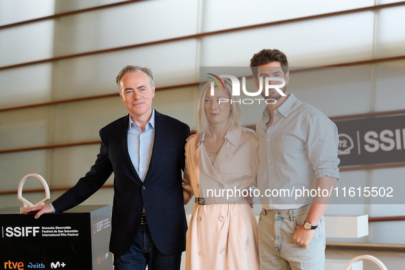 John Crowley, Andrew Garfield, and Fiona Weir attend the photocall for ''We Live in the Time'' during the 72nd San Sebastian International F...