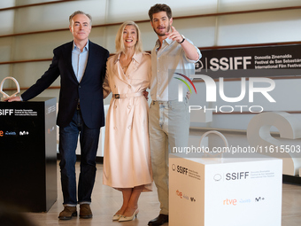 John Crowley, Andrew Garfield, and Fiona Weir attend the photocall for ''We Live in the Time'' during the 72nd San Sebastian International F...