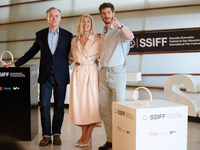 John Crowley, Andrew Garfield, and Fiona Weir attend the photocall for ''We Live in the Time'' during the 72nd San Sebastian International F...