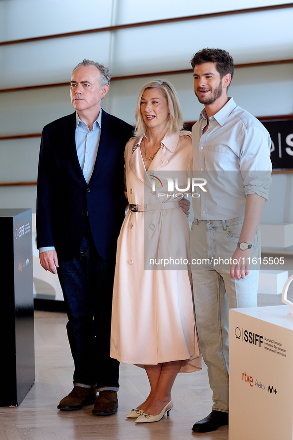 John Crowley, Andrew Garfield, and Fiona Weir attend the photocall for ''We Live in the Time'' during the 72nd San Sebastian International F...