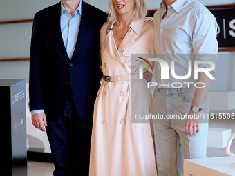 John Crowley, Andrew Garfield, and Fiona Weir attend the photocall for ''We Live in the Time'' during the 72nd San Sebastian International F...