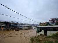 Nepal's Armed Police Force rescues stranded people using a zipline rescue method from a flooded river in Lalitpur, Nepal, on September 28, 2...