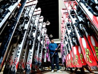 Staff members repair skis at the Qilian Mountain ski resort in Zhangye, China, on September 28, 2024. (