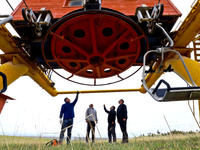 Staff members check the safety operation of the gondola at the Qilian Mountain ski resort in Zhangye, China, on September 28, 2024. (