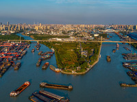 A photo taken on September 28, 2024, shows water transport along the Beijing-Hangzhou Grand Canal in Huai'an, Jiangsu province, China. (