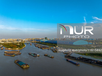 A photo taken on September 28, 2024, shows water transport along the Beijing-Hangzhou Grand Canal in Huai'an, Jiangsu province, China. (