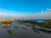 A photo taken on September 28, 2024, shows water transport along the Beijing-Hangzhou Grand Canal in Huai'an, Jiangsu province, China. (